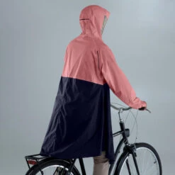 BTWIN PONCHO PLUIE VÉLO 900 ROSE / BLEU MARINE 9 BTWIN PONCHO PLUIE VÉLO 900 ROSE / BLEU MARINE -Vélo Mania poncho pluie velo 900 rose bleu marine 2
